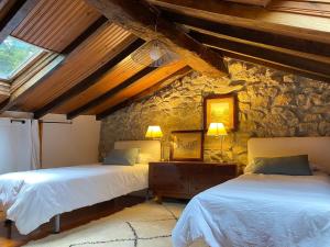 Postel nebo postele na pokoji v ubytování Casa Guardamino - Naturaleza