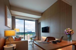 TV a/nebo společenská místnost v ubytování Momentus Hotel Alexandra