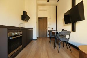 Køkken eller tekøkken på Cavour Suites