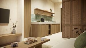 Η κουζίνα ή μικρή κουζίνα στο Palmea Suites