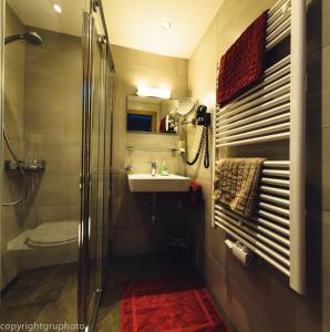a bathroom with a shower and a sink at Haus Stockibach in Sankt Anton am Arlberg