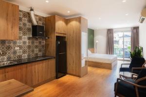 Køkken eller tekøkken på LPM Apartment Pho Hue
