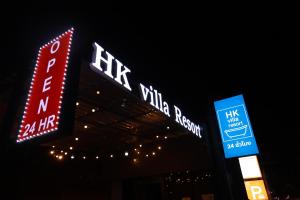 a group of signs on the side of a building at HK Villa Resort in Bangkok +7 photos