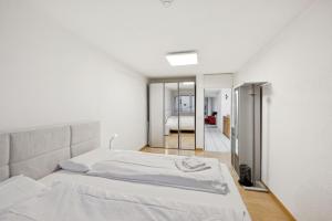 Ένα ή περισσότερα κρεβάτια σε δωμάτιο στο Marlin Home