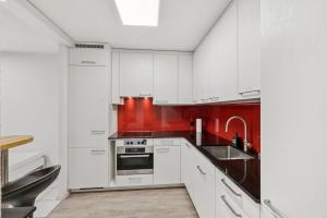 Η κουζίνα ή μικρή κουζίνα στο Marlin Home +8 φωτογραφίες