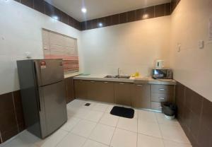 Køkken eller tekøkken på PLAY at Iris Resort Tanah Rata