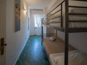 Postel nebo postele na pokoji v ubytování Scimiscià 2-bedroom Apartment with AC + 27 fotografií