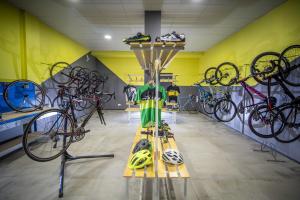 a room with a bunch of bikes on display at Hotel Cap Negret in Altea