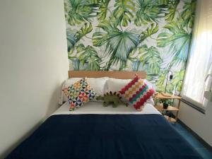 En eller flere senge i et værelse på Fetta di Limone Apartment with AC and Patio