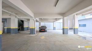 a car parked in an empty parking lot at Chic studio with parking and pool in Douala