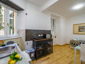 Kuchyň nebo kuchyňský kout v ubytování Specciu Village Life Family Apartment + 29 fotografií