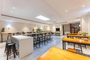 Restaurace v ubytování IU Hotel Wujiang Huadong Business City Tongli