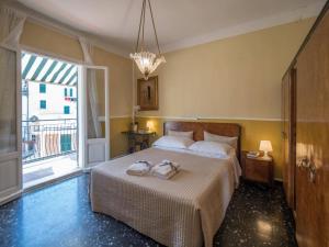 Postel nebo postele na pokoji v ubytování Recanissu Apartment with balcony & AC