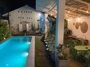 Swimmingpoolen hos eller tæt på 1929 Sudu Colonial House