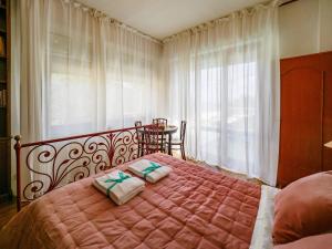 En eller flere senge i et værelse på Villa Tanca With AC, Terrace and Views