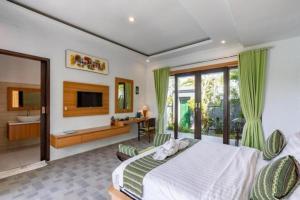 Postel nebo postele na pokoji v ubytování Villa Rama Penida by ABM + 62 fotografií