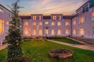 Zahrada ubytování L'Horloge - Appart'Hotel proche de Disneyland