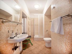 a bathroom with a sink and a toilet at Nová Hájovna in Říčky