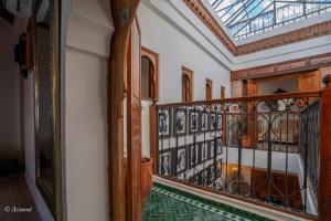 a balcony in a house with a glass ceiling at Riad La Sultana in Chefchaouene