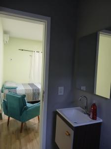 En eller flere senge i et værelse på Studio Completo no Centro de Foz