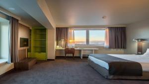 Postel nebo postele na pokoji v ubytování B&B Hotel Nowy Targ Centrum