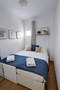 En eller flere senge i et værelse på Feels like home in Paraiso