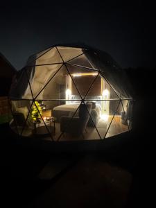 a room in a dome tent at night at Princess Milena in London