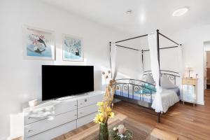 Ένα ή περισσότερα κρεβάτια σε δωμάτιο στο Domus Lux 53