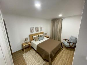 En eller flere senge i et værelse på Casa do Barbosa + 6 billeder