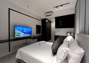 Μια τηλεόραση ή/και κέντρο ψυχαγωγίας στο Majestic Residence Klcc by Luxury