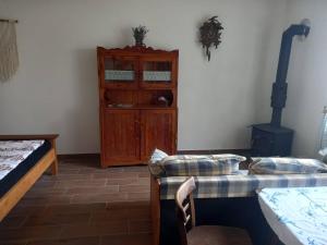 En eller flere senge i et værelse på Ubytováni U rybníčku + 3 billeder