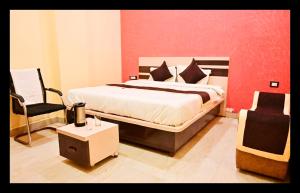 En eller flere senge i et værelse på The In Dira Valley