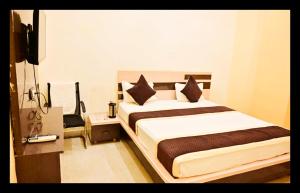 En eller flere senge i et værelse på The In Dira Valley