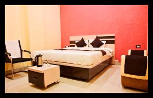 En eller flere senge i et værelse på The In Dira Valley