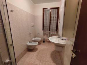 Koupelna v ubytování Le Terrazze del Garda - Immobili e Soluzioni Rent + 243 fotografií