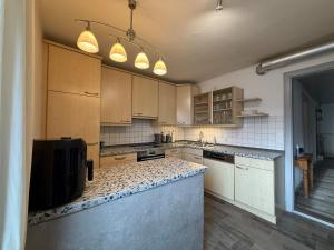 Kuchyň nebo kuchyňský kout v ubytování Haus Raschke