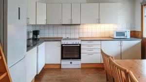 Kuchyň nebo kuchyňský kout v ubytování Villavilla #126 - Öland, Sverige