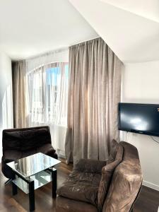 TV a/nebo společenská místnost v ubytování Hotel Nebula Inn