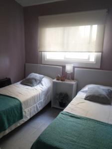 Postel nebo postele na pokoji v ubytování Entre lomas + 8 fotografií