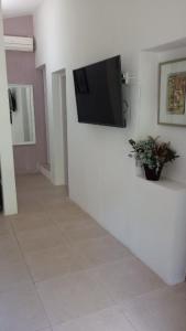 TV a/nebo společenská místnost v ubytování Entre lomas