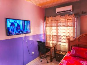 Et tv og/eller underholdning på Water Side Guest House