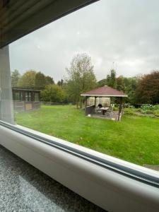 Κήπος έξω από το CALM HOME im Erdgeschoss mit eigenem Eingang