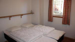 En eller flere senge i et værelse på Villavilla #127 - Öland, Sverige