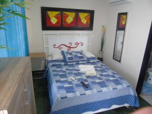 Voodi või voodid majutusasutuse Caribbean Island Hotel toas