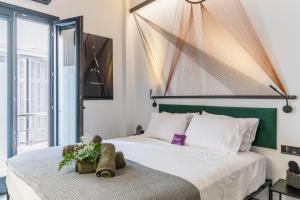 Giường trong phòng chung tại Artrock Experience Loft Gallery +73 ảnh