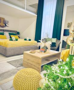 En eller flere senge i et værelse på Cuddle Corner Budapest