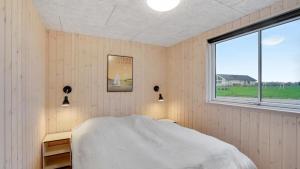 Ένα ή περισσότερα κρεβάτια σε δωμάτιο στο Villavilla #545 - Hostrup Strand, Limfjorden