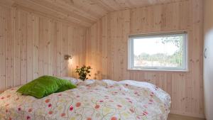 En eller flere senge i et værelse på Villavilla #303 - Öland, Sverige