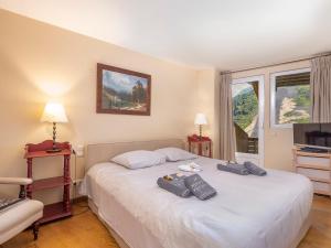 Postel nebo postele na pokoji v ubytování Chalet Babayaga, 7 pièces, 12 pers, accès skis aux pieds - FR-1-314-306