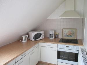 Kuchyň nebo kuchyňský kout v ubytování Corinnas Ferienwohnung